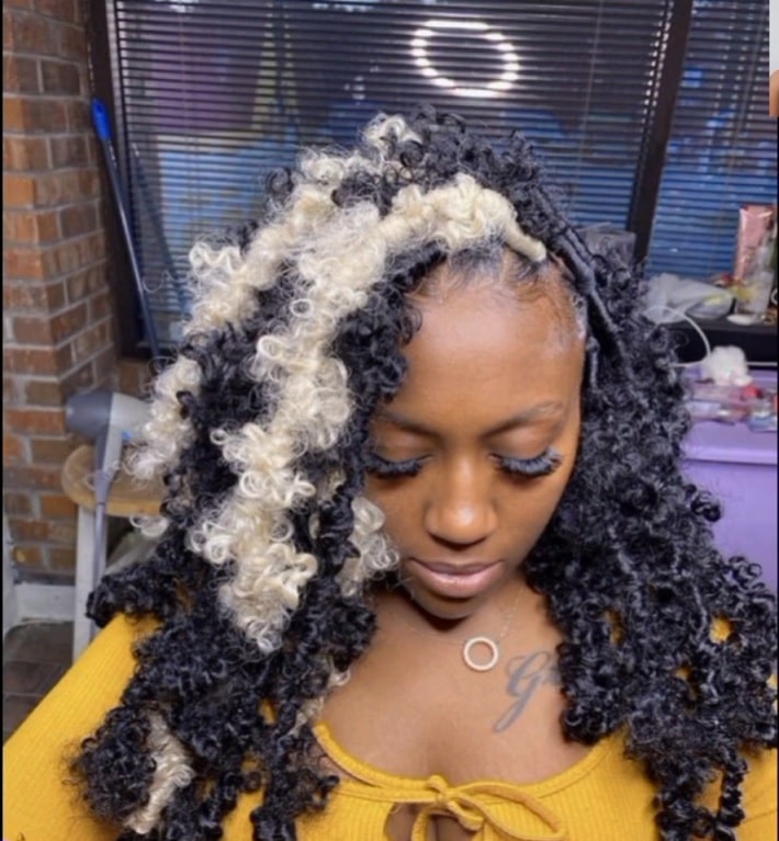 shoulder length black on white butterfly locs with color thevenusface