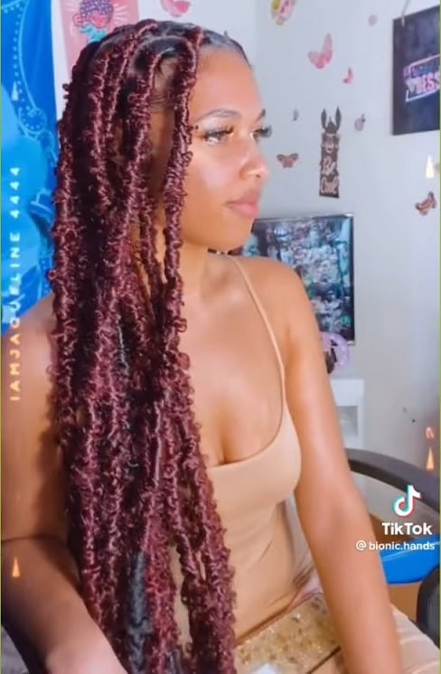 long dark burgundy butterfly locs with color thevenusface